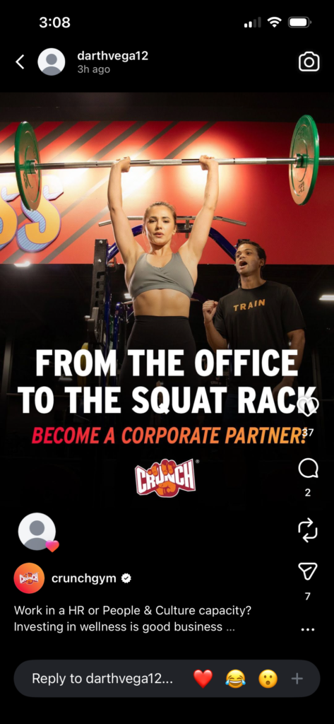 Crunch Fitness ad as instagram featuring woman holding like 80 pounds of barbell weights over her head