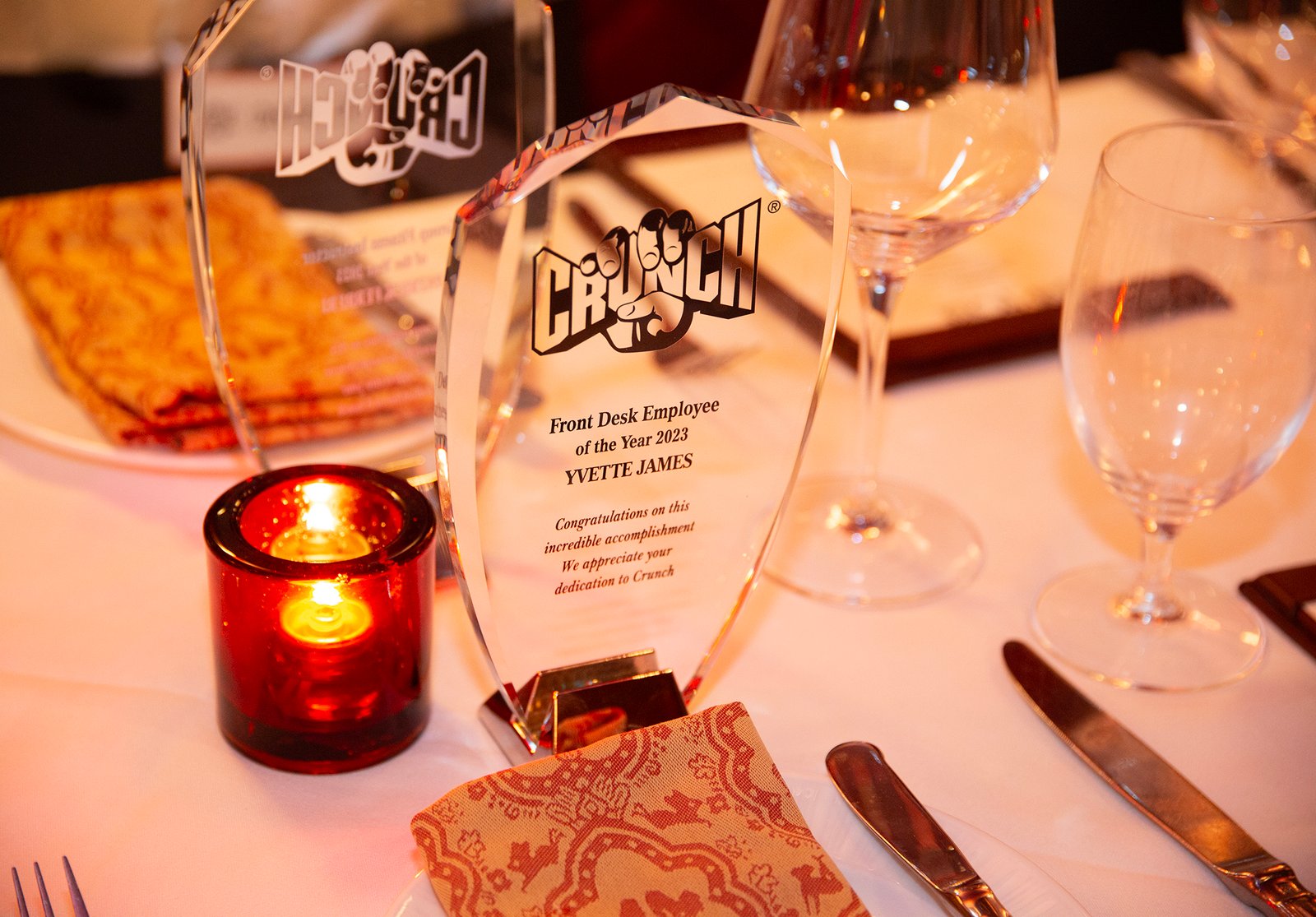 Crunch crystal award on dinner table awaiting recipient